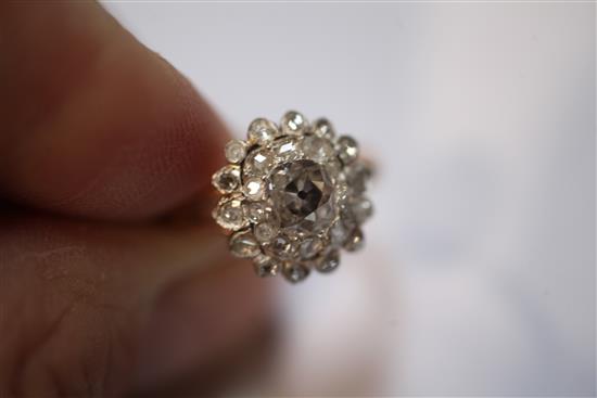 A 19th century gold, silver and diamond cluster ring, size K.